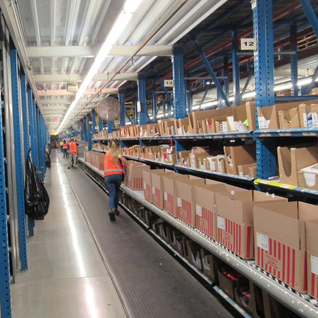 ReaderLink employees packing orders at the warehouse